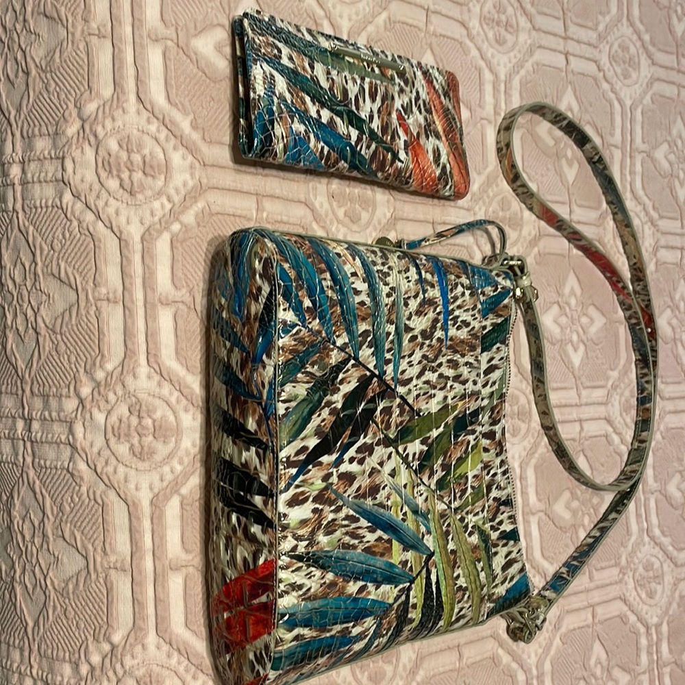 Set consisting of Katie hand bag and Ady wallet.  Excellent condition on both.